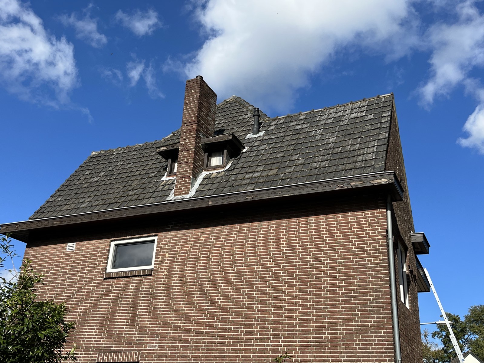 Verweerde dakbedekking
